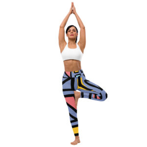 Woman doing a yoga pose wearing abstract design leggings